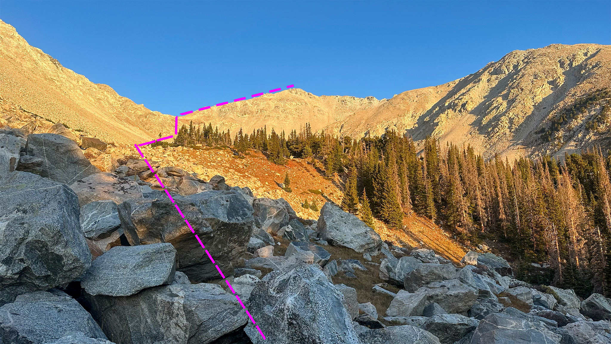 In the Upper Hughes Creek basin, skirt talus to the south and the forested area to the north, as you make your way to the southeast slopes